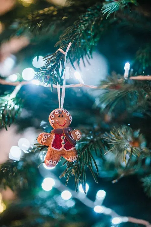 Festive Gingerbread Ornament with Bokeh Lights · Free Stock Photo