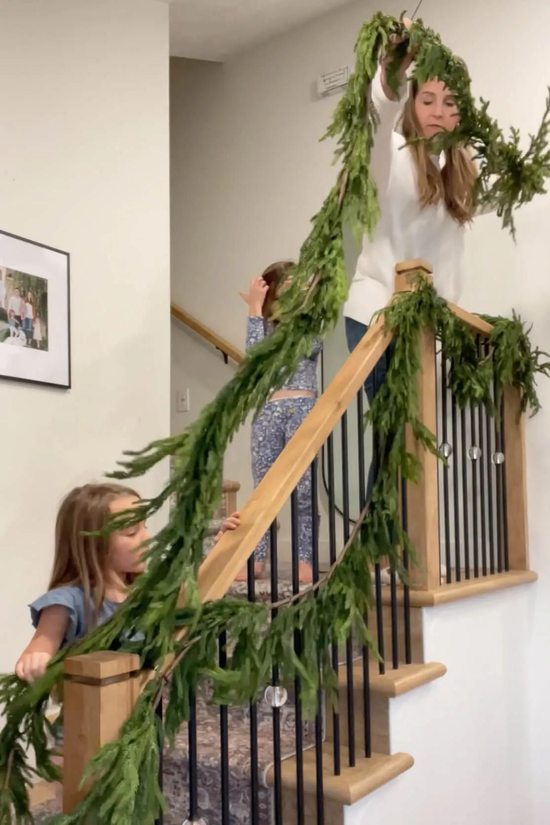 How to Decorate With Christmas Garland on a Staircase | Crystel Montenegro  Home