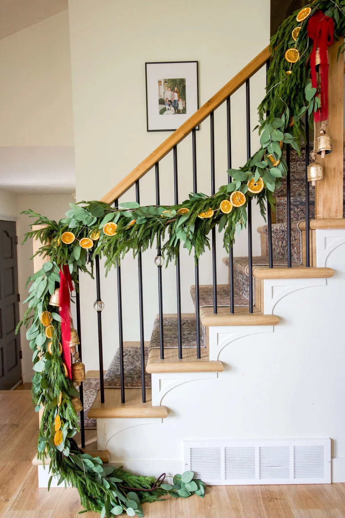 How to Decorate With Christmas Garland on a Staircase | Crystel Montenegro  Home