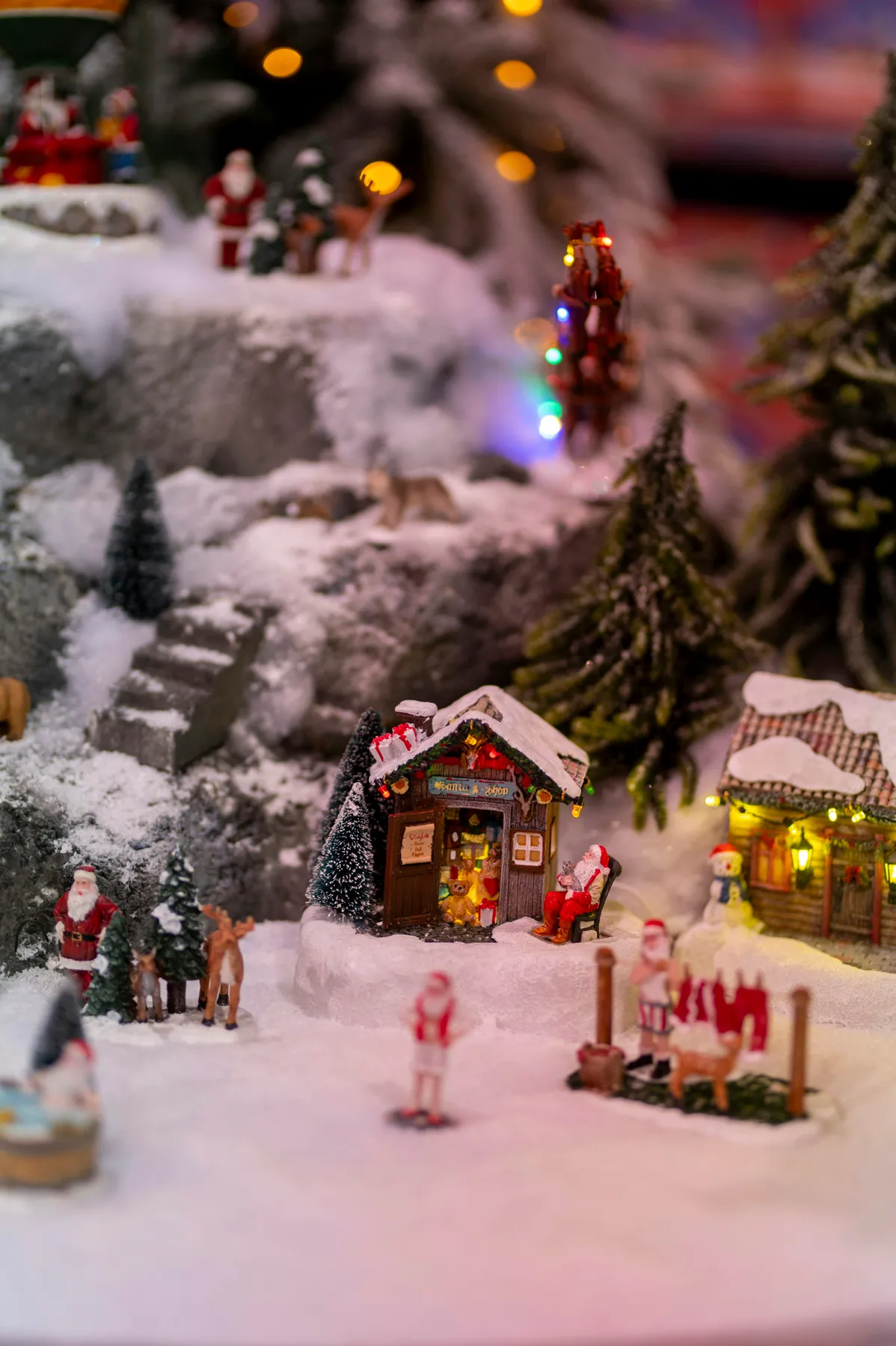 Miniature christmas village scene with santa figures - Free Photo on  Unsplash