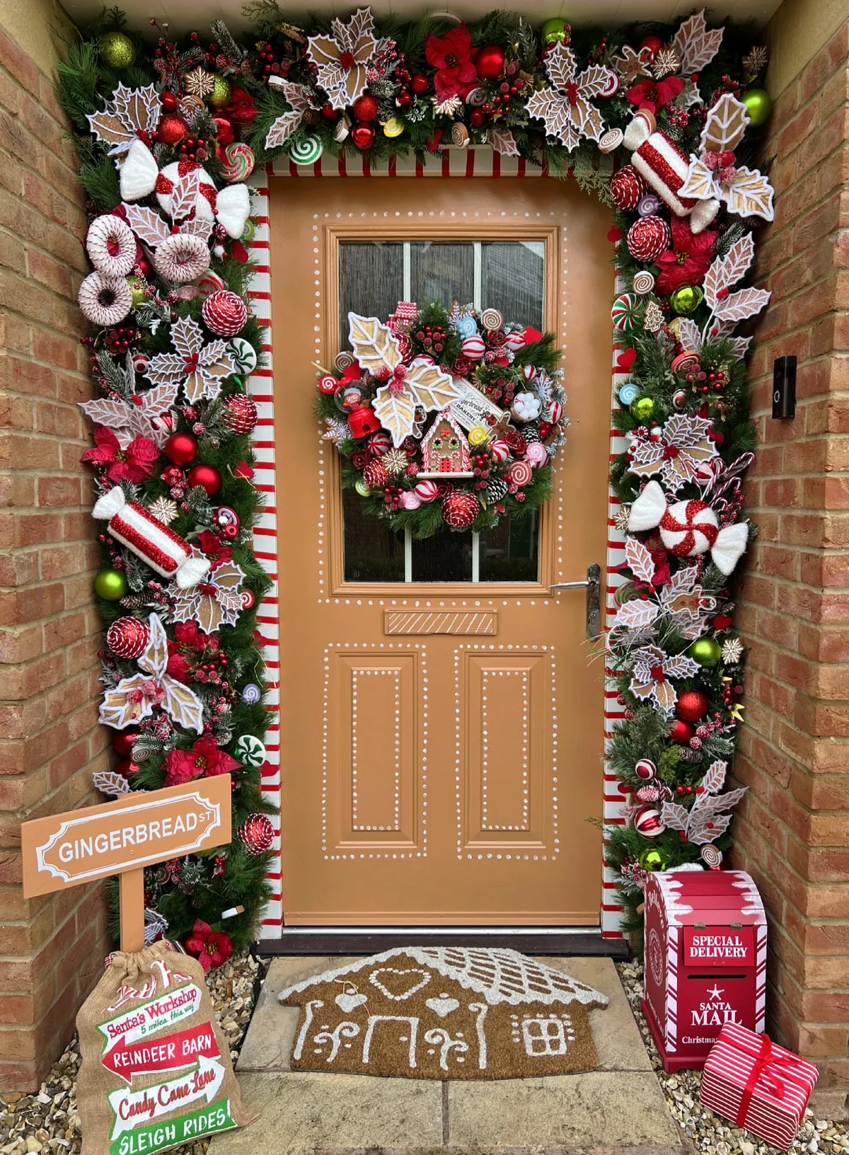 My neighbours can't stand my tacky Christmas door displays but I love going OTT – I think I'll turn them around this year' - What's The Jam