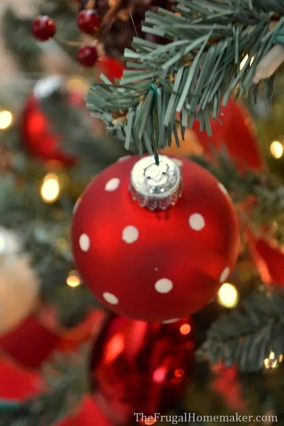 Red and white Christmas tree with natural elements