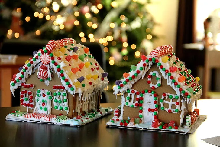 Royalty-Free photo: Close up photograph of two brown-and-white house fondant cakes | PickPik