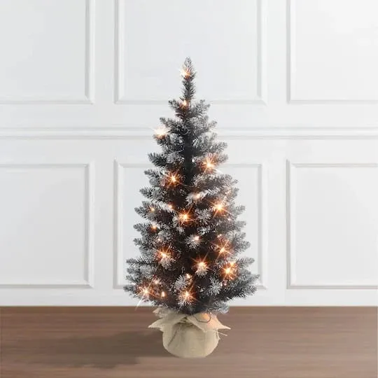 Seasonal Delight: 3ft. Pre-Lit Black Pine Artificial Christmas Tree, Clear  Incandescent Lights Christmas Gifts Available at Christmas Designers Store  Texas United States.