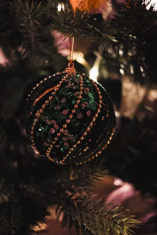Sparkling Green Ornament on Christmas Tree · Free Stock Photo