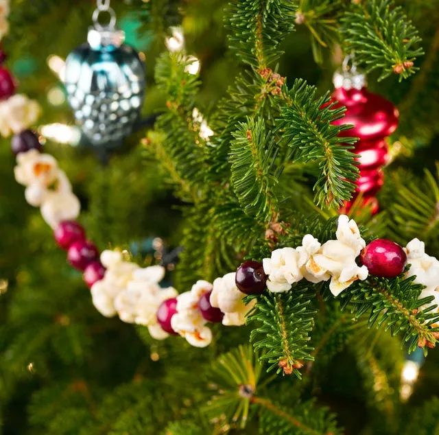 Stringing Cranberry Garland How To Make A DIY Cranberry Garland