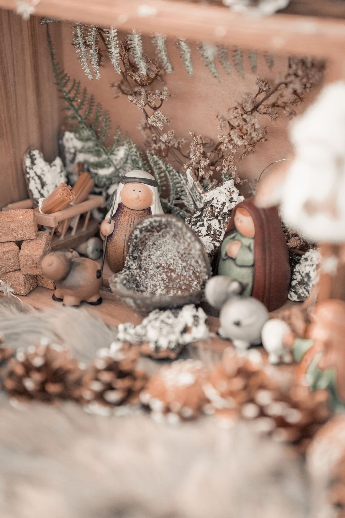 Warm and detailed nativity scene with handcrafted figurines, perfect for holiday decorations.